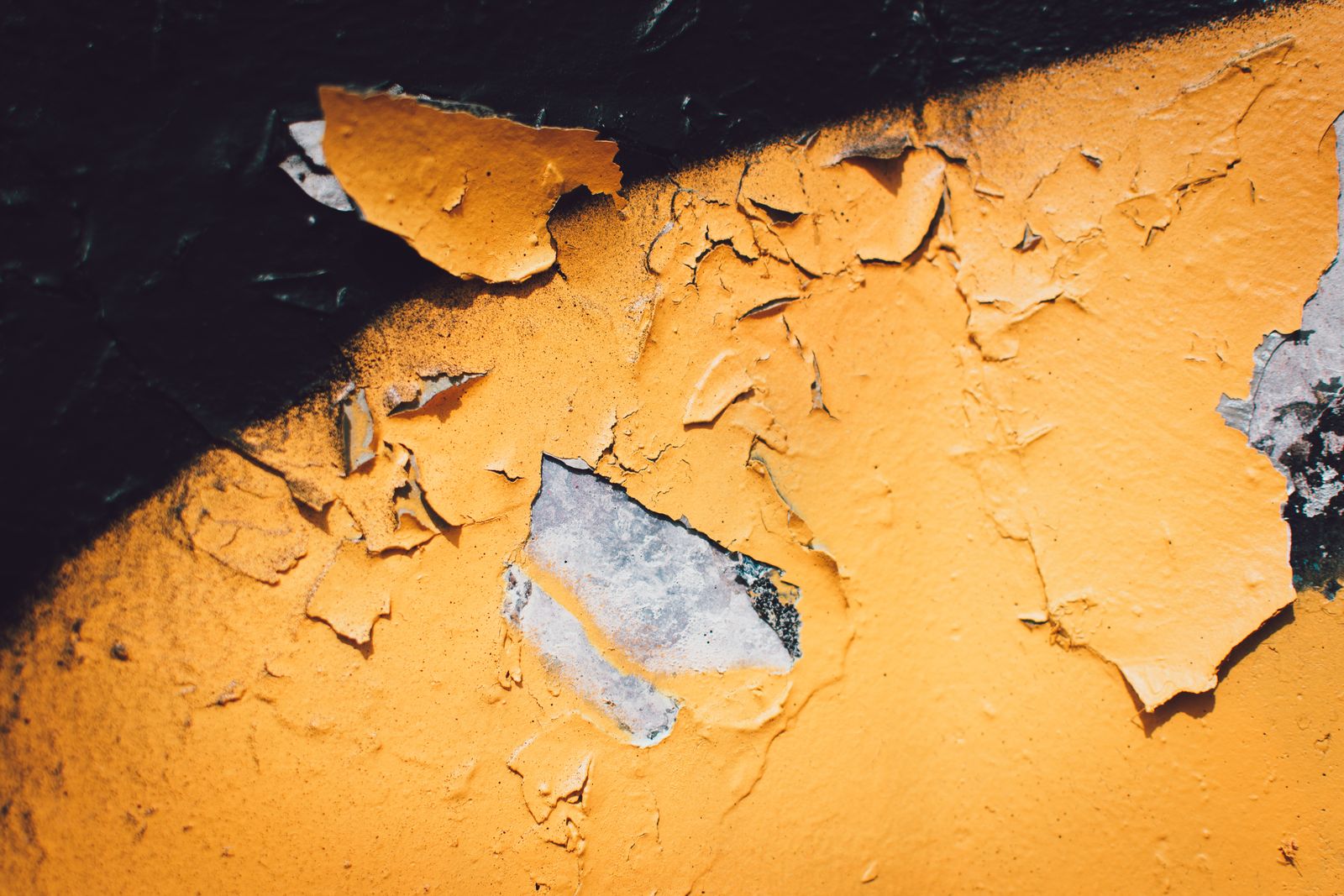 Peeling paint on an exterior wall