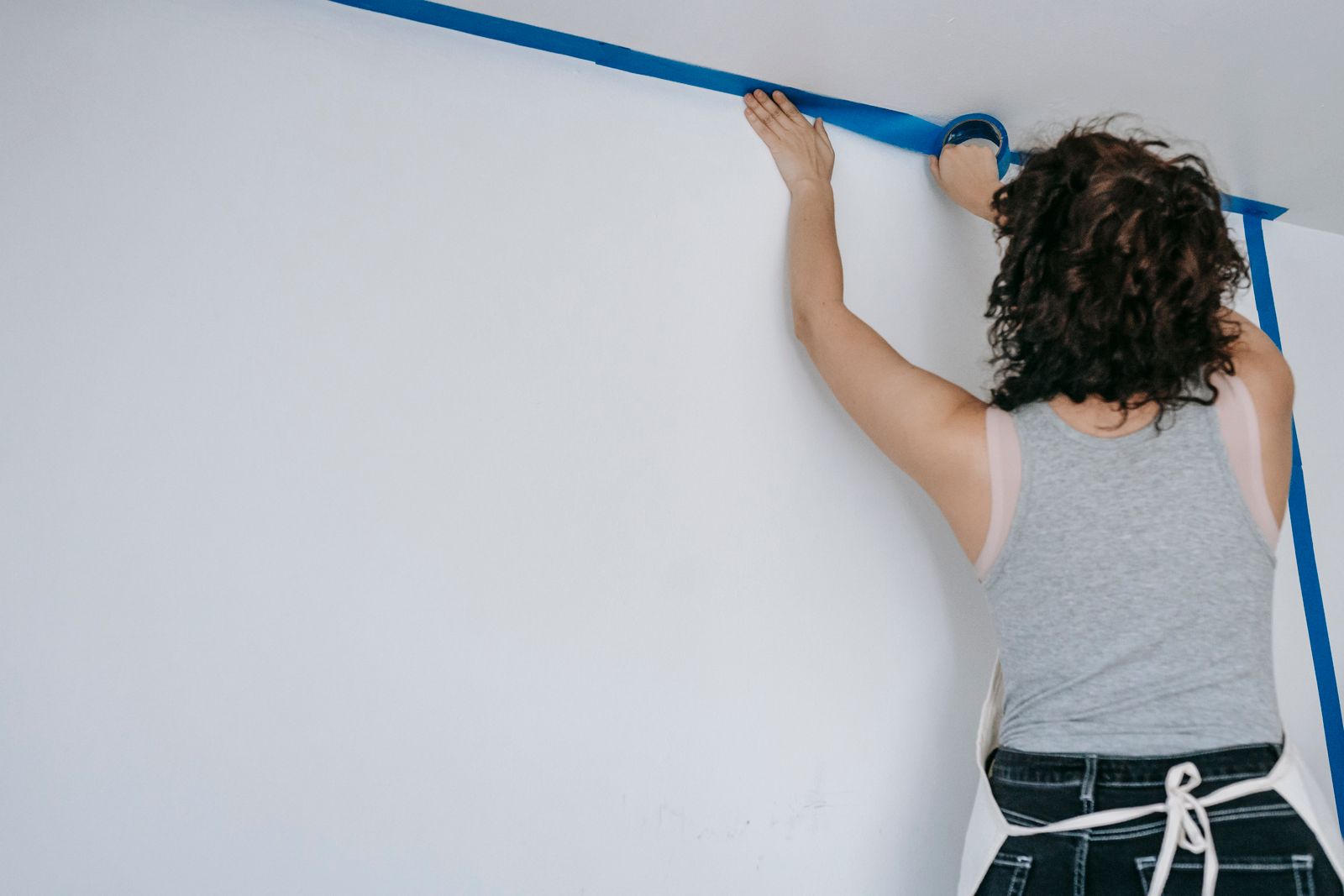 Masking a wall with painter’s tape