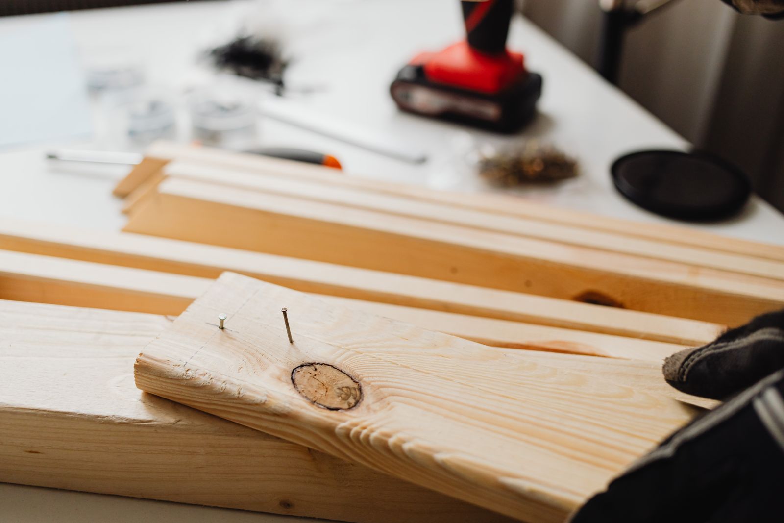 A power drill fixing timber